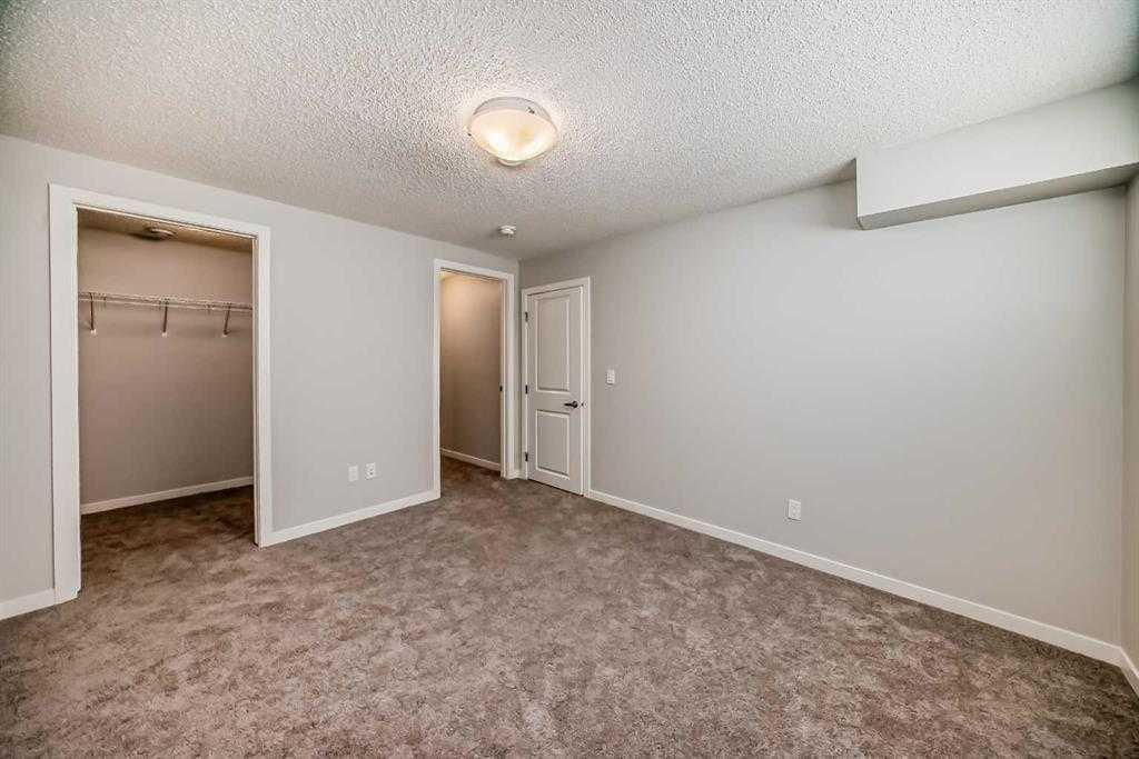 401-250 Fireside View, Cochrane, AB - Indoor Photo Showing Other Room