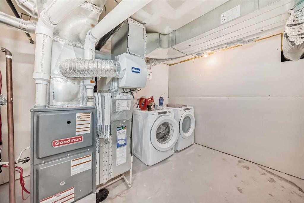 401-250 Fireside View, Cochrane, AB - Indoor Photo Showing Laundry Room