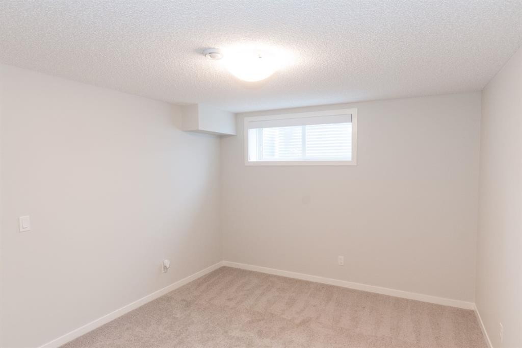 401-250 Fireside View, Cochrane, AB - Indoor Photo Showing Other Room