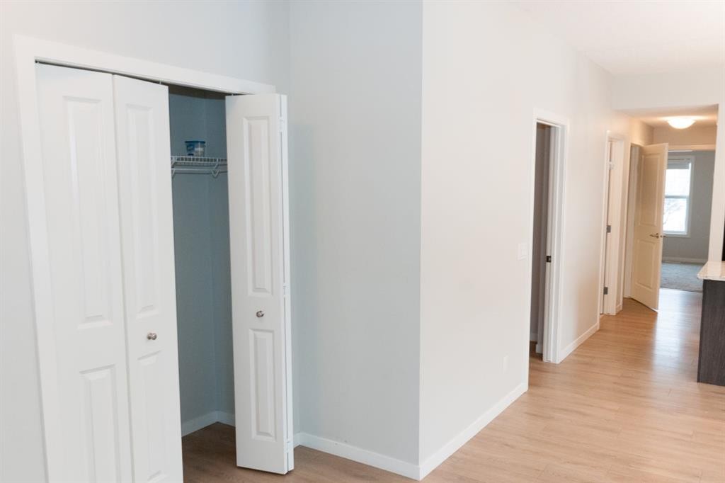 401-250 Fireside View, Cochrane, AB - Indoor Photo Showing Other Room