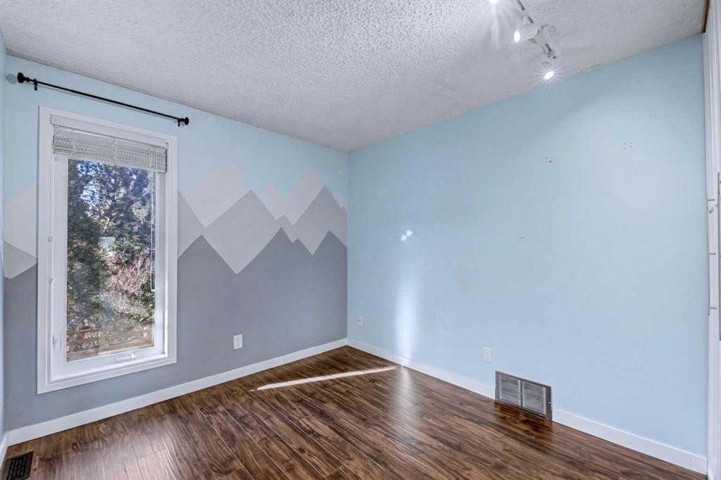 188 Bernard Drive Nw, Calgary, AB - Indoor Photo Showing Other Room