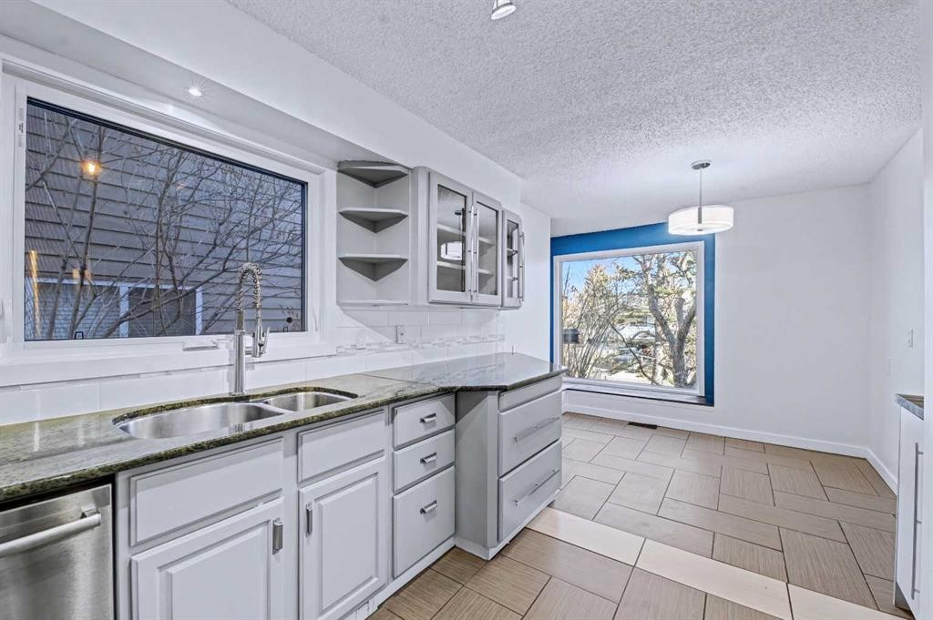 188 Bernard Drive Nw, Calgary, AB - Indoor Photo Showing Kitchen With Double Sink