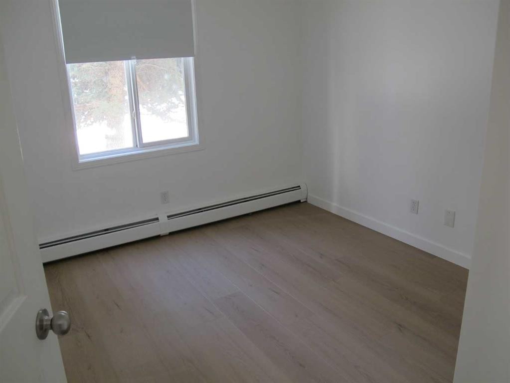 1117-12 Cimarron Common, Okotoks, AB - Indoor Photo Showing Other Room