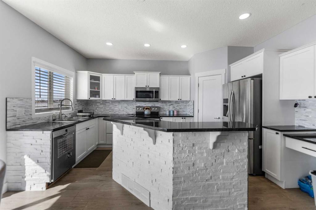 328 Rainbow Falls Way, Chestermere, AB - Indoor Photo Showing Kitchen With Upgraded Kitchen
