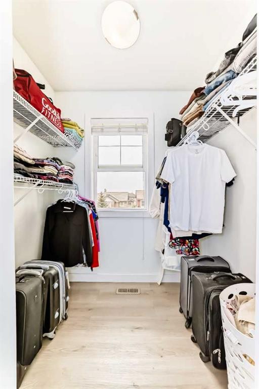 119 Panatella Hill Nw, Calgary, AB - Indoor With Storage