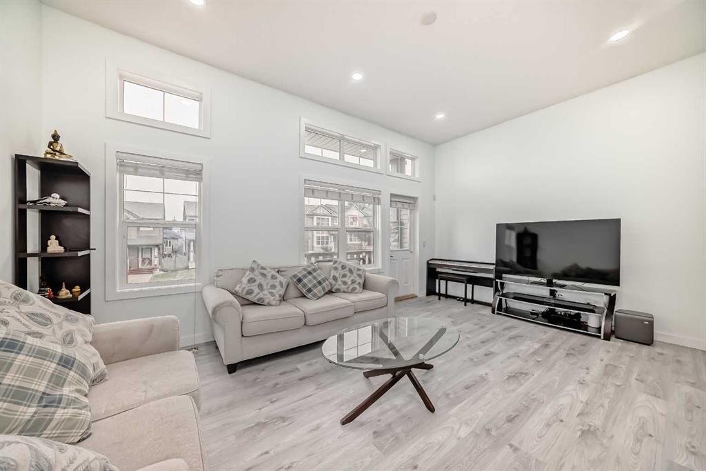 119 Panatella Hill Nw, Calgary, AB - Indoor Photo Showing Living Room