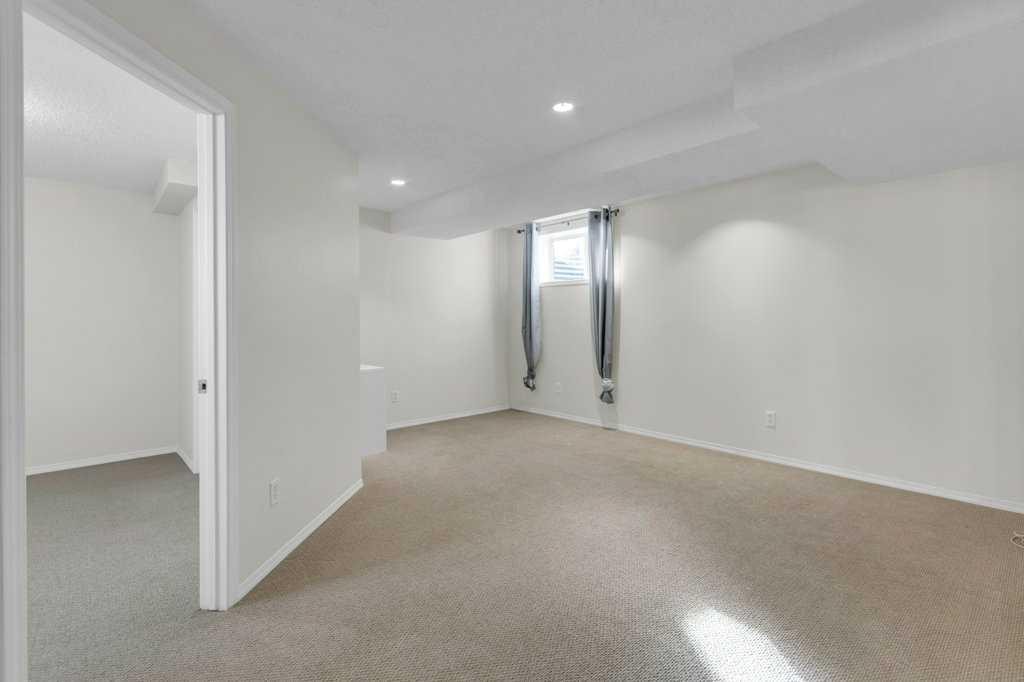 11185 Hidden Valley Drive Nw, Calgary, AB - Indoor Photo Showing Other Room