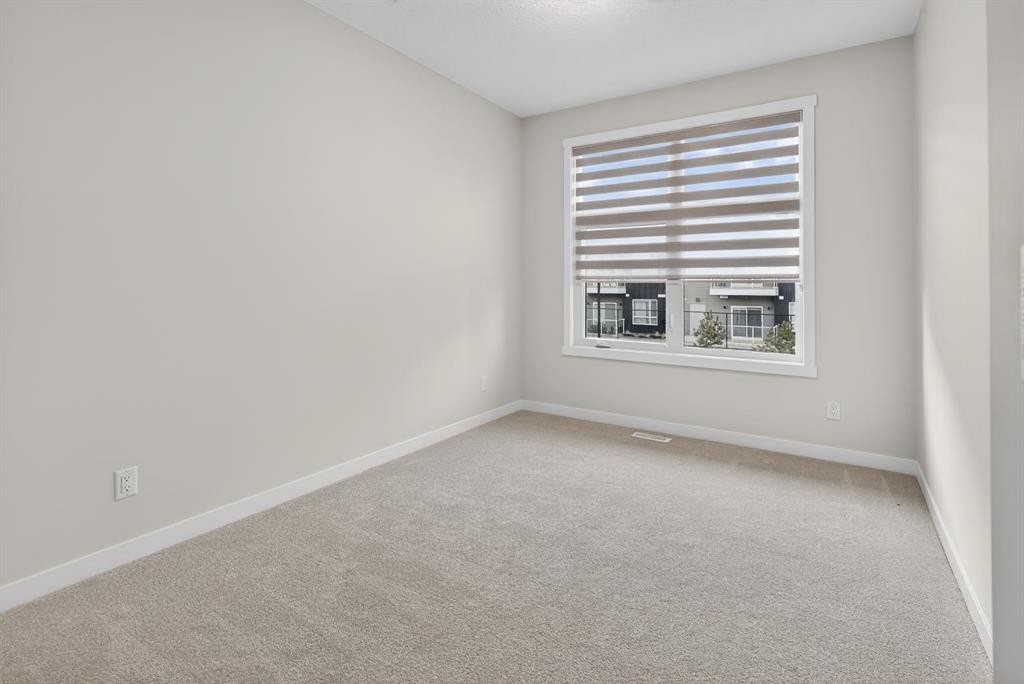 203-400 Belmont Street Sw, Calgary, AB - Indoor Photo Showing Other Room