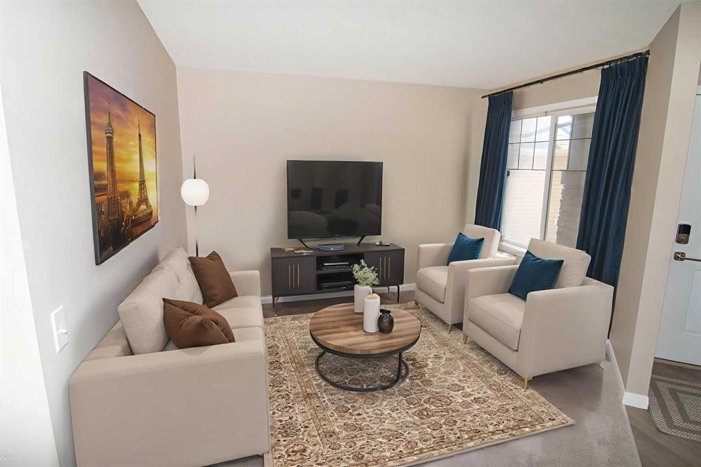 24 Panamount Lane Nw, Calgary, AB - Indoor Photo Showing Living Room