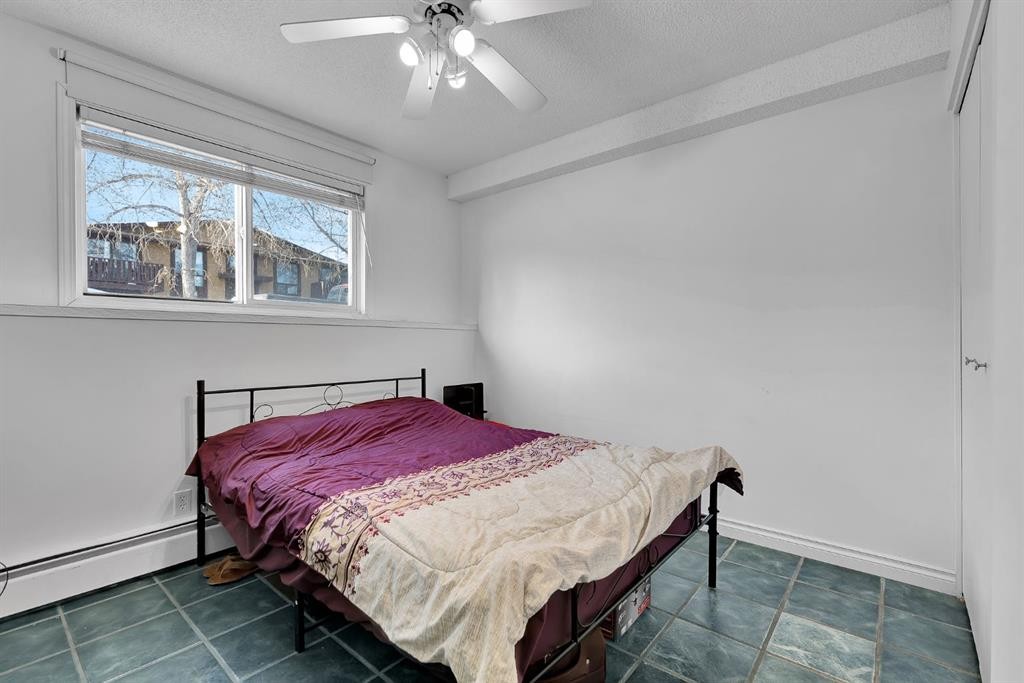 4-104 Sabrina Way Sw, Calgary, AB - Indoor Photo Showing Bedroom