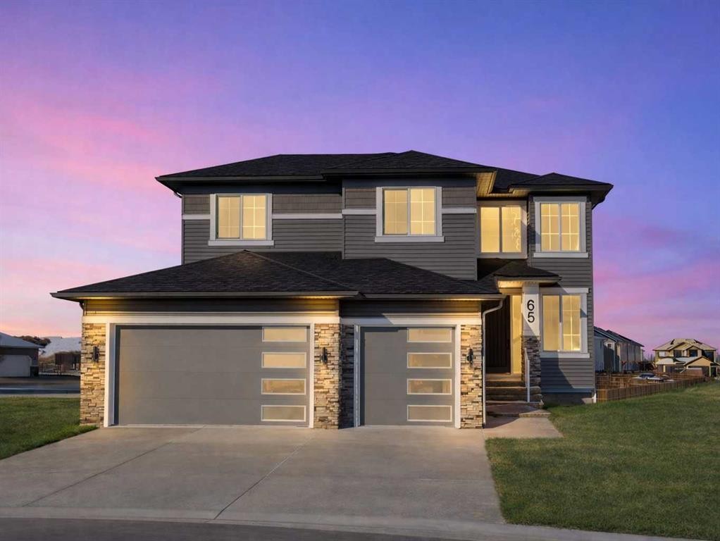 65 Lakes Estates Circle, Strathmore, AB - Outdoor With Facade