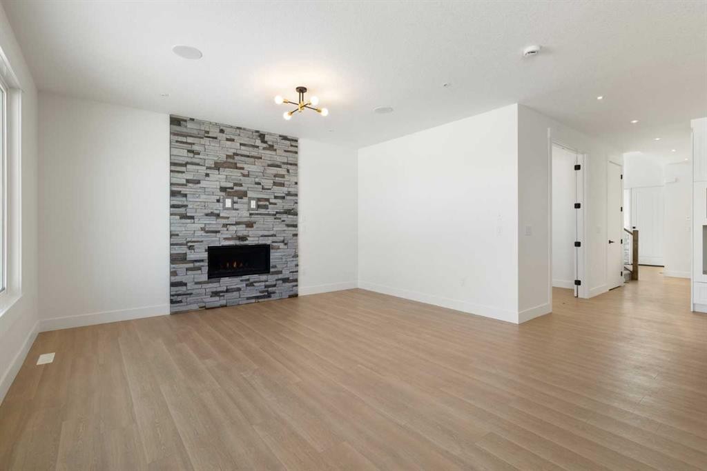 65 Lakes Estates Circle, Strathmore, AB - Indoor Photo Showing Living Room With Fireplace