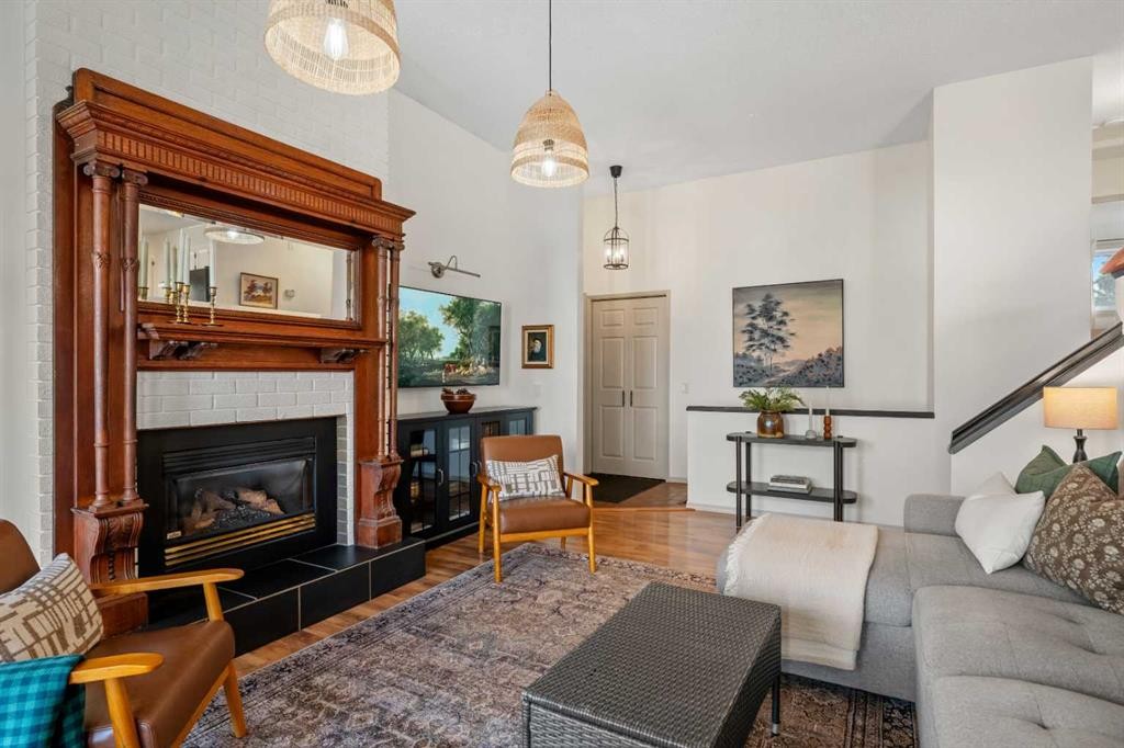 51 Berwick Hill Nw, Calgary, AB - Indoor Photo Showing Living Room With Fireplace