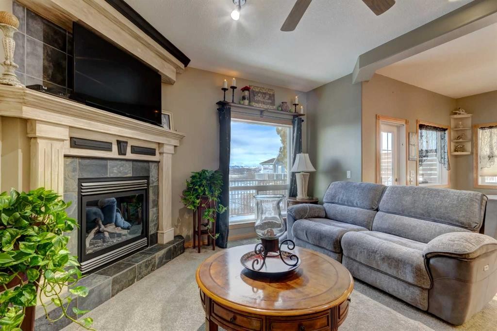 533 Highwood Drive, Longview, AB - Indoor Photo Showing Living Room With Fireplace