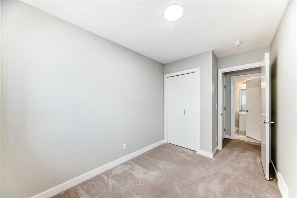 112 Evanscrest Square Nw, Calgary, AB - Indoor Photo Showing Other Room