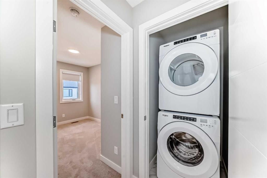 112 Evanscrest Square Nw, Calgary, AB - Indoor Photo Showing Laundry Room