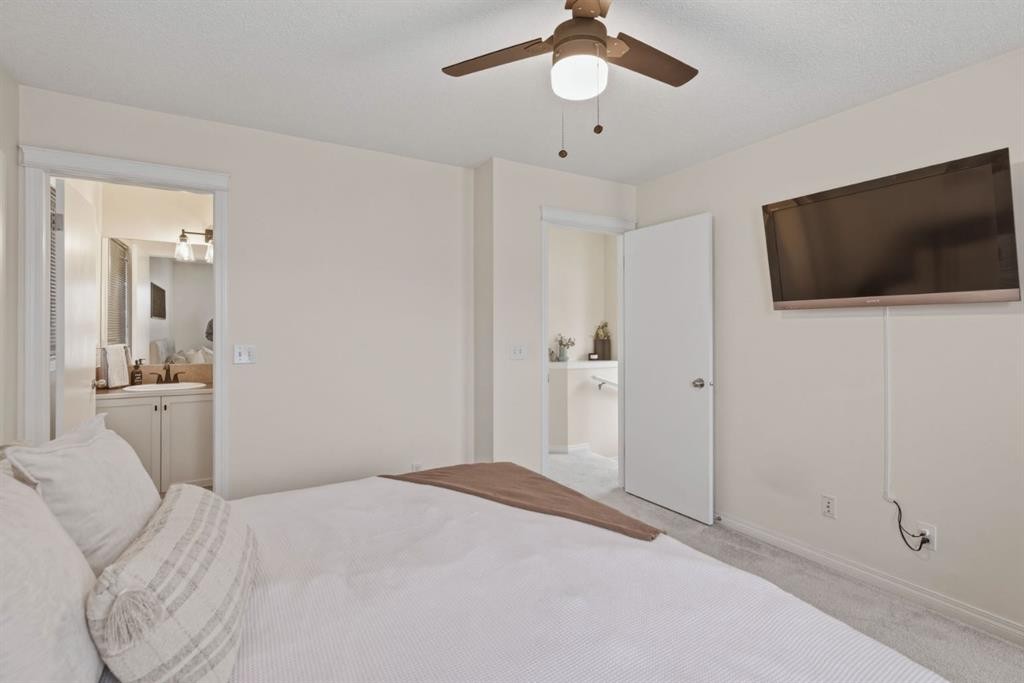 59 Prestwick Bay Se, Calgary, AB - Indoor Photo Showing Bedroom