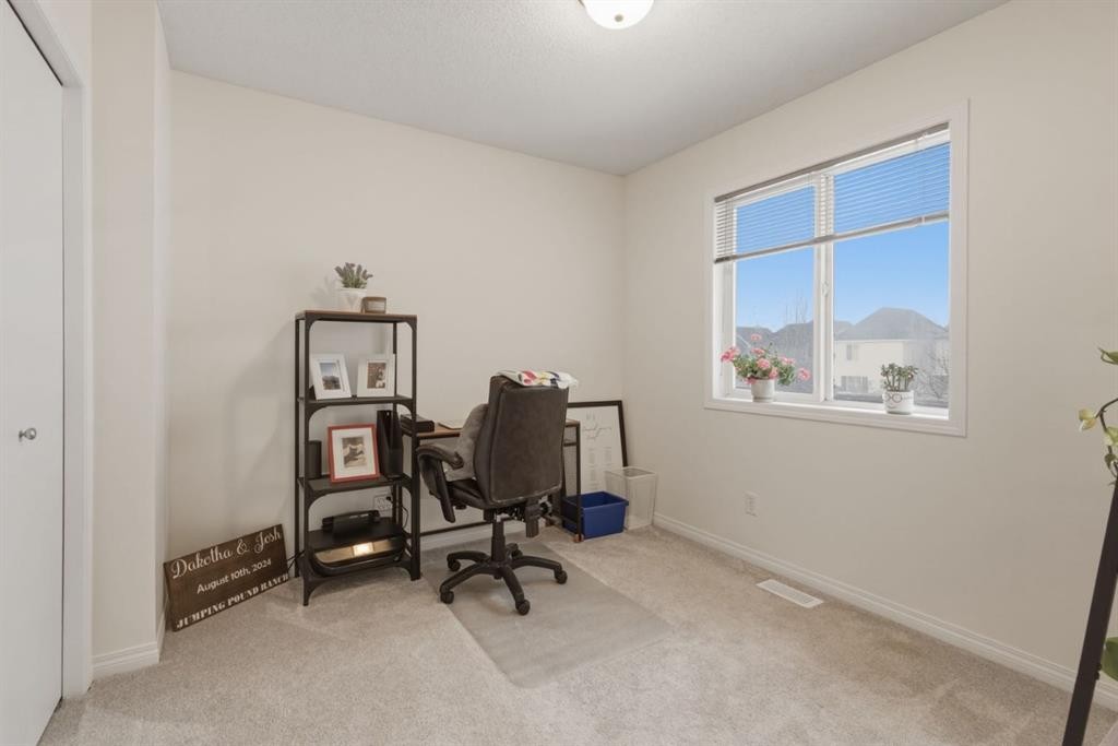 59 Prestwick Bay Se, Calgary, AB - Indoor Photo Showing Other Room