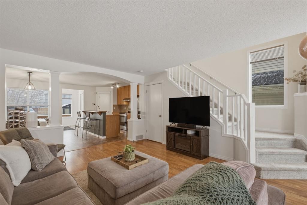 59 Prestwick Bay Se, Calgary, AB - Indoor Photo Showing Living Room