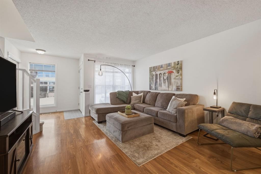 59 Prestwick Bay Se, Calgary, AB - Indoor Photo Showing Living Room