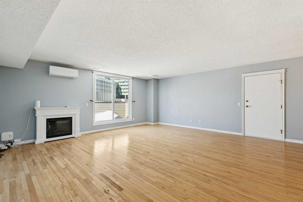 1104-1540 29 Street Nw, Calgary, AB - Indoor With Fireplace