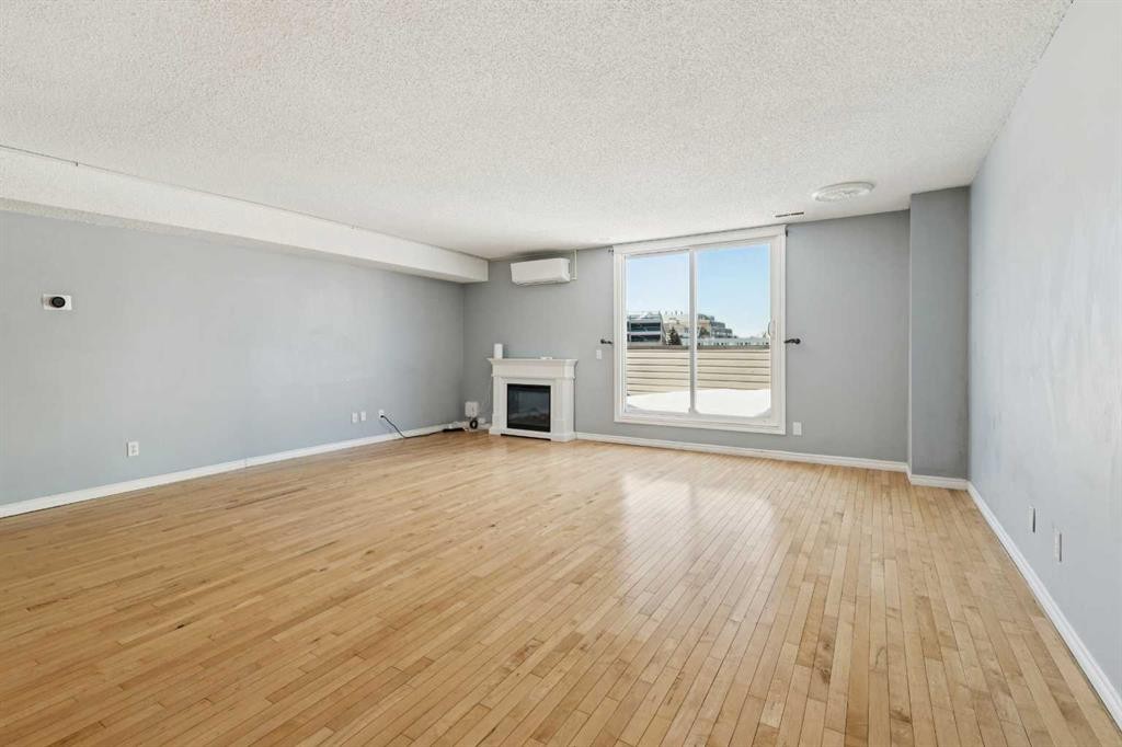 1104-1540 29 Street Nw, Calgary, AB - Indoor With Fireplace