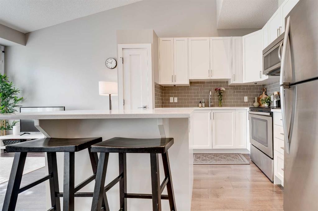 165 Evanscrest Gardens Nw, Calgary, AB - Indoor Photo Showing Kitchen With Upgraded Kitchen