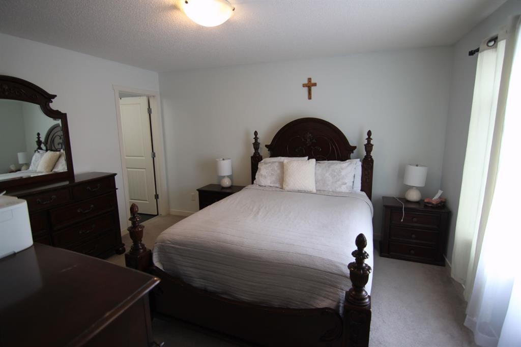 337 Copperpond Landing Se, Calgary, AB - Indoor Photo Showing Bedroom