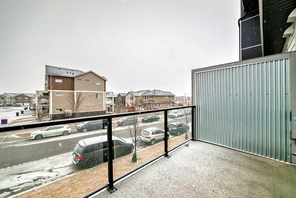 202-245 Redstone Walk Ne, Calgary, AB - Outdoor With Balcony With Exterior