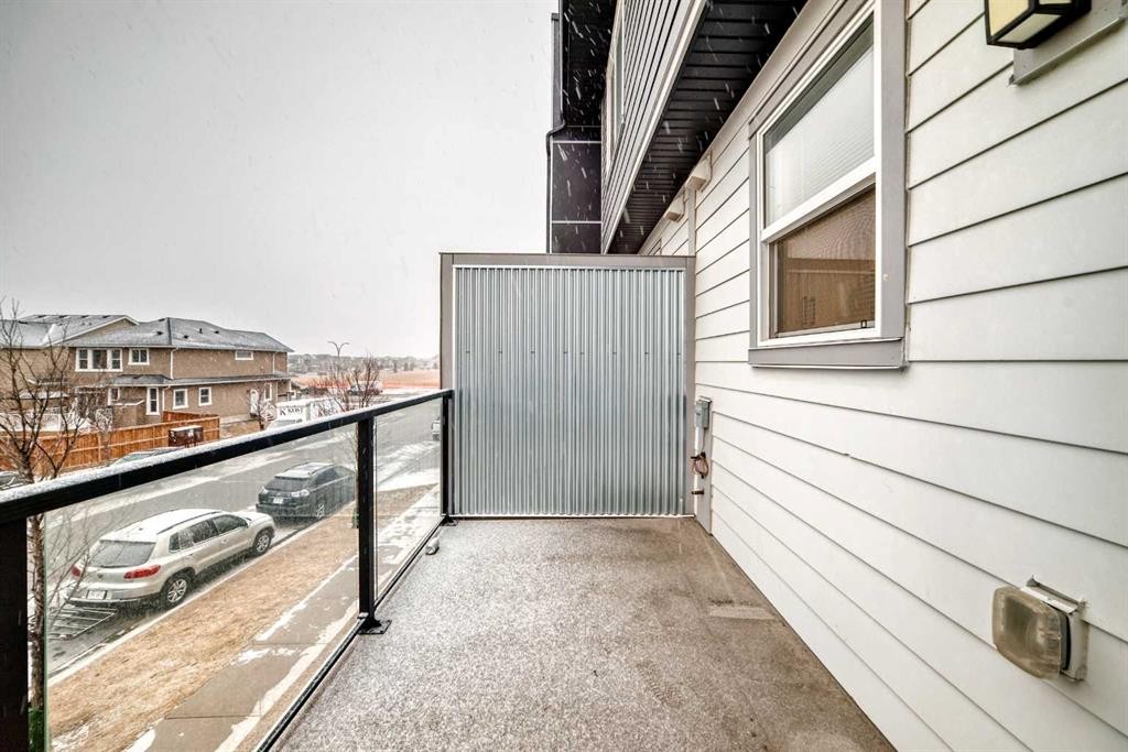 202-245 Redstone Walk Ne, Calgary, AB - Outdoor With Balcony With Exterior