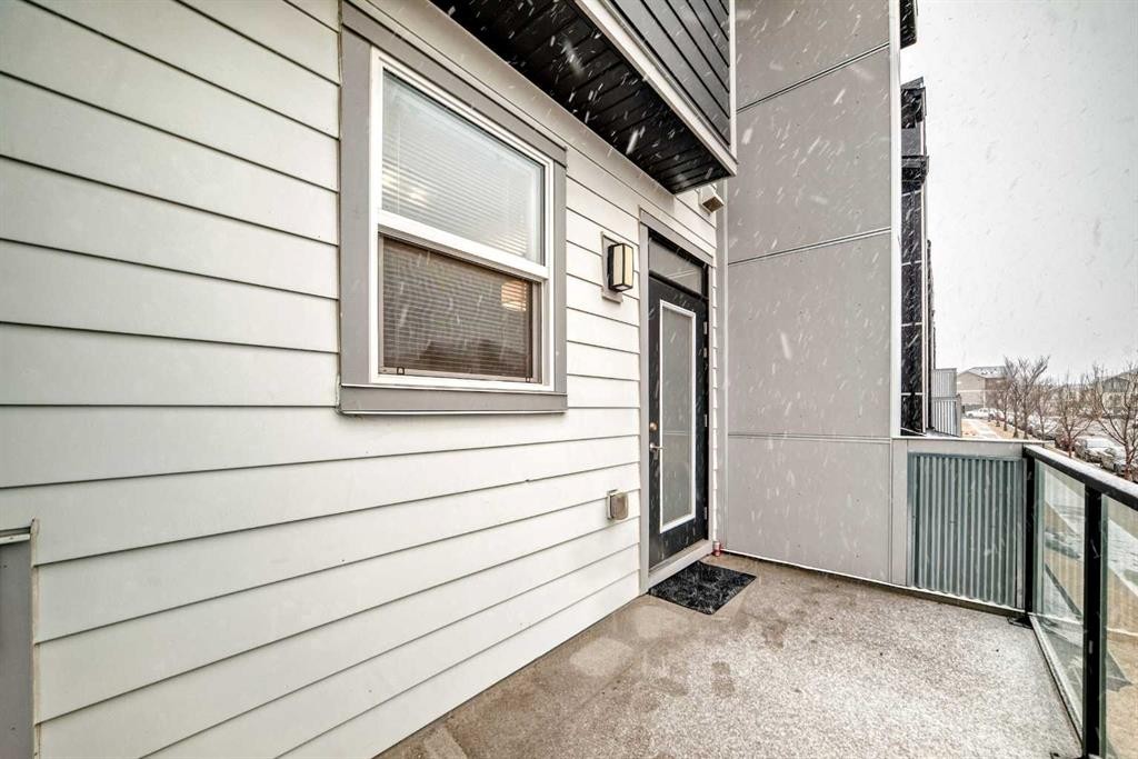 202-245 Redstone Walk Ne, Calgary, AB - Outdoor With Balcony With Exterior