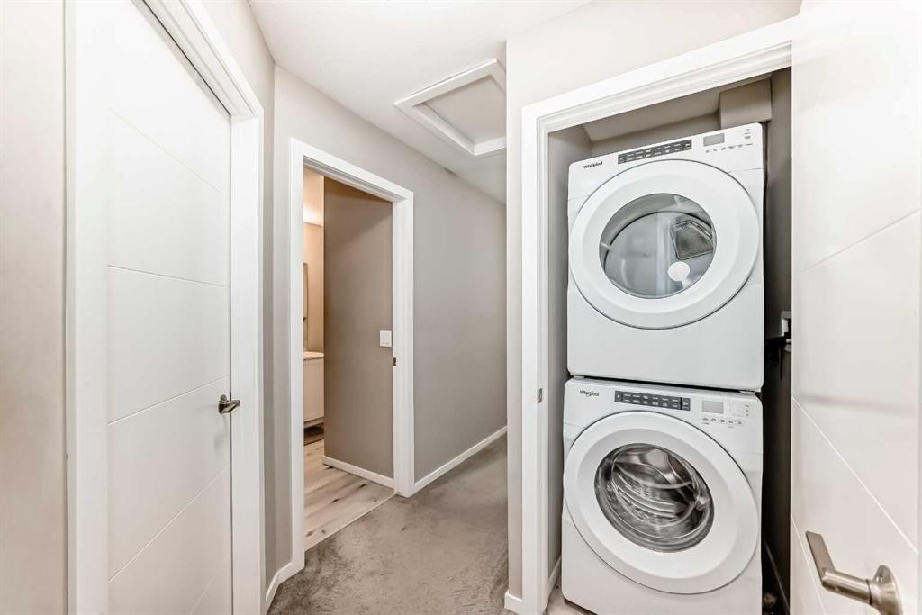 202-245 Redstone Walk Ne, Calgary, AB - Indoor Photo Showing Laundry Room
