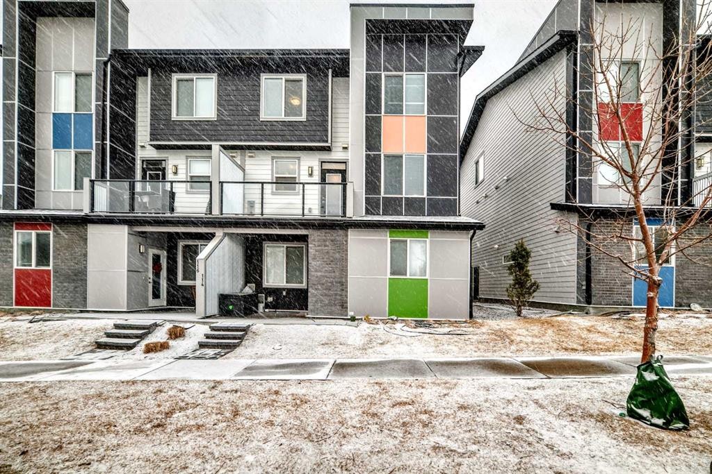 202-245 Redstone Walk Ne, Calgary, AB - Outdoor With Balcony With Facade