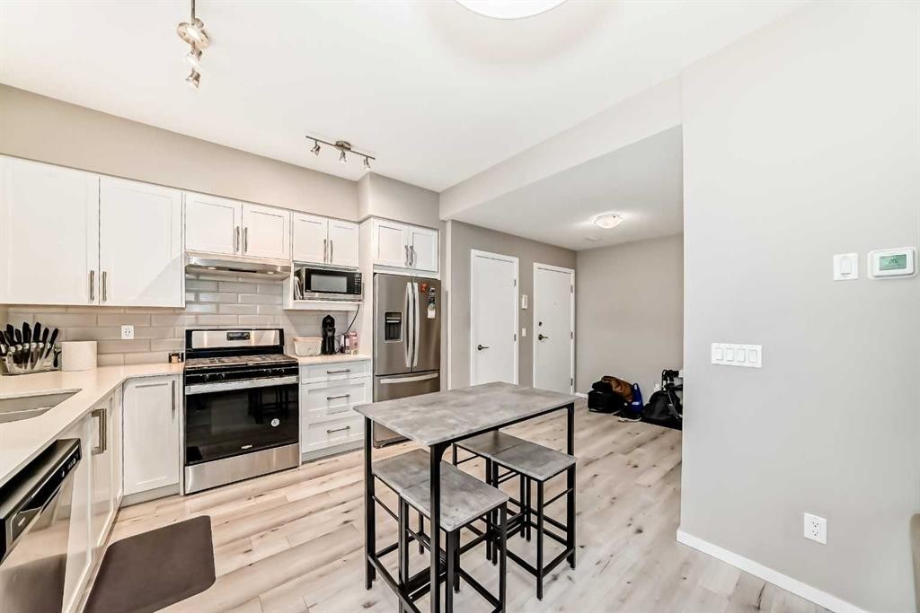 202-245 Redstone Walk Ne, Calgary, AB - Indoor Photo Showing Kitchen