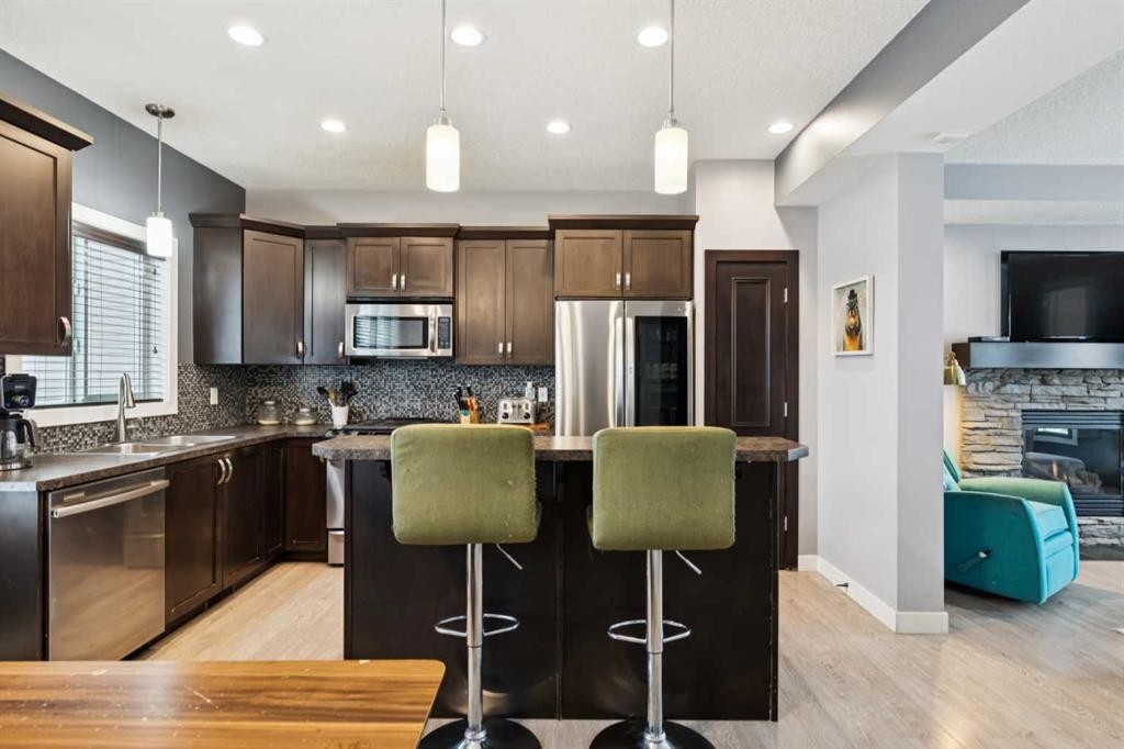 231 Prestwick Point Se, Calgary, AB - Indoor Photo Showing Kitchen With Stainless Steel Kitchen With Double Sink With Upgraded Kitchen