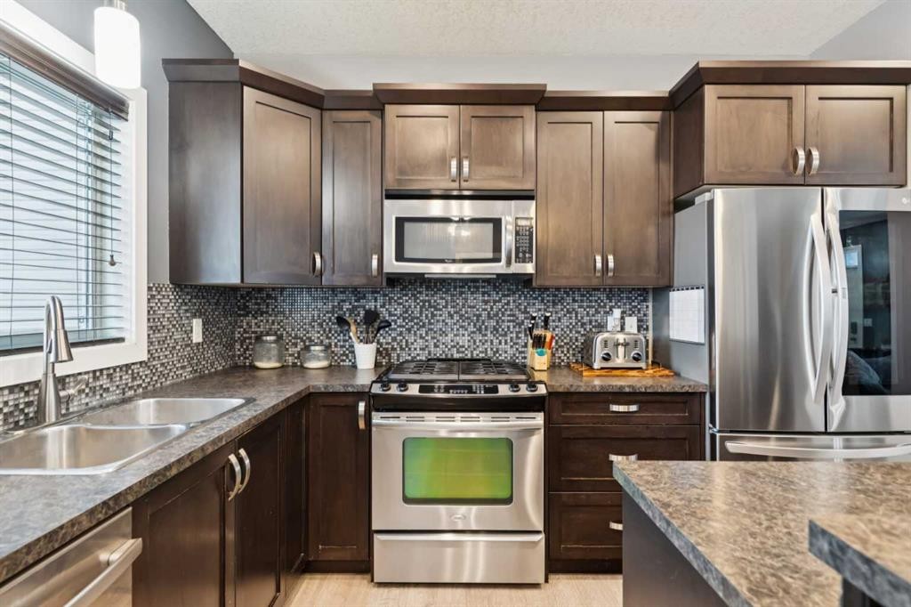 231 Prestwick Point Se, Calgary, AB - Indoor Photo Showing Kitchen With Stainless Steel Kitchen With Double Sink With Upgraded Kitchen