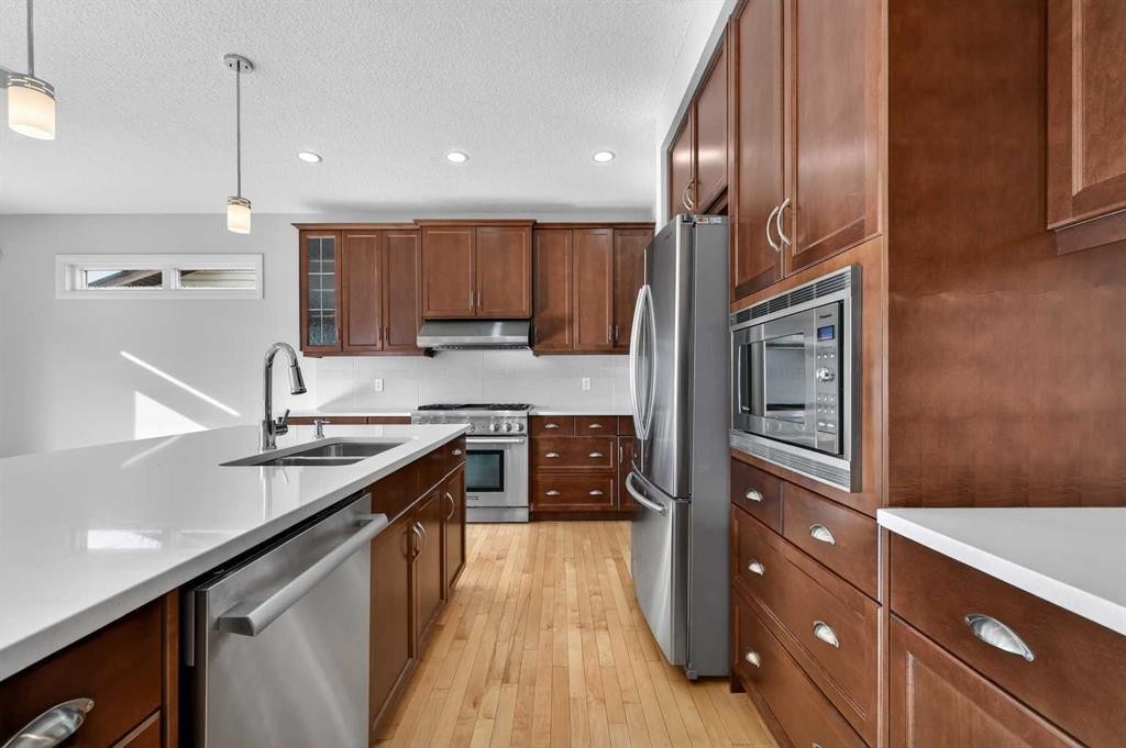 182 Cranarch Place Se, Calgary, AB - Indoor Photo Showing Kitchen With Double Sink With Upgraded Kitchen