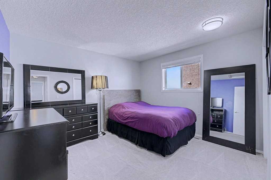 24 Sunlake Circle Se, Calgary, AB - Indoor Photo Showing Bedroom