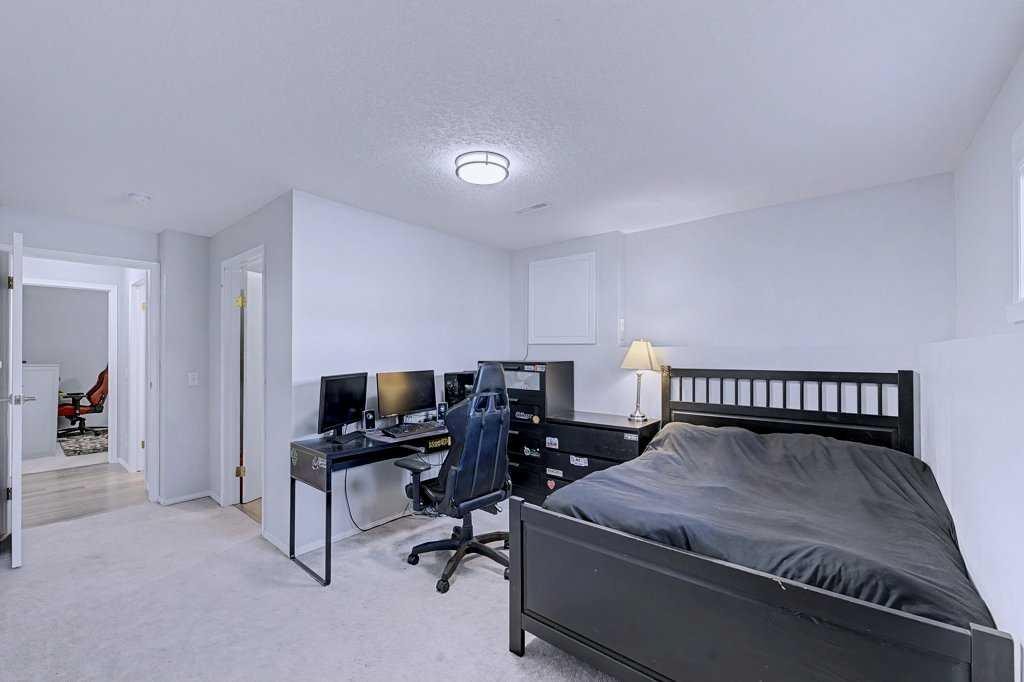 24 Sunlake Circle Se, Calgary, AB - Indoor Photo Showing Bedroom