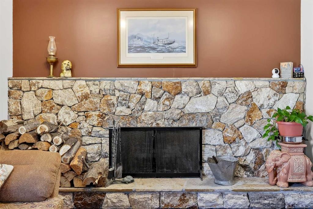 168 Midlake Boulevard Se, Calgary, AB - Indoor Photo Showing Living Room With Fireplace