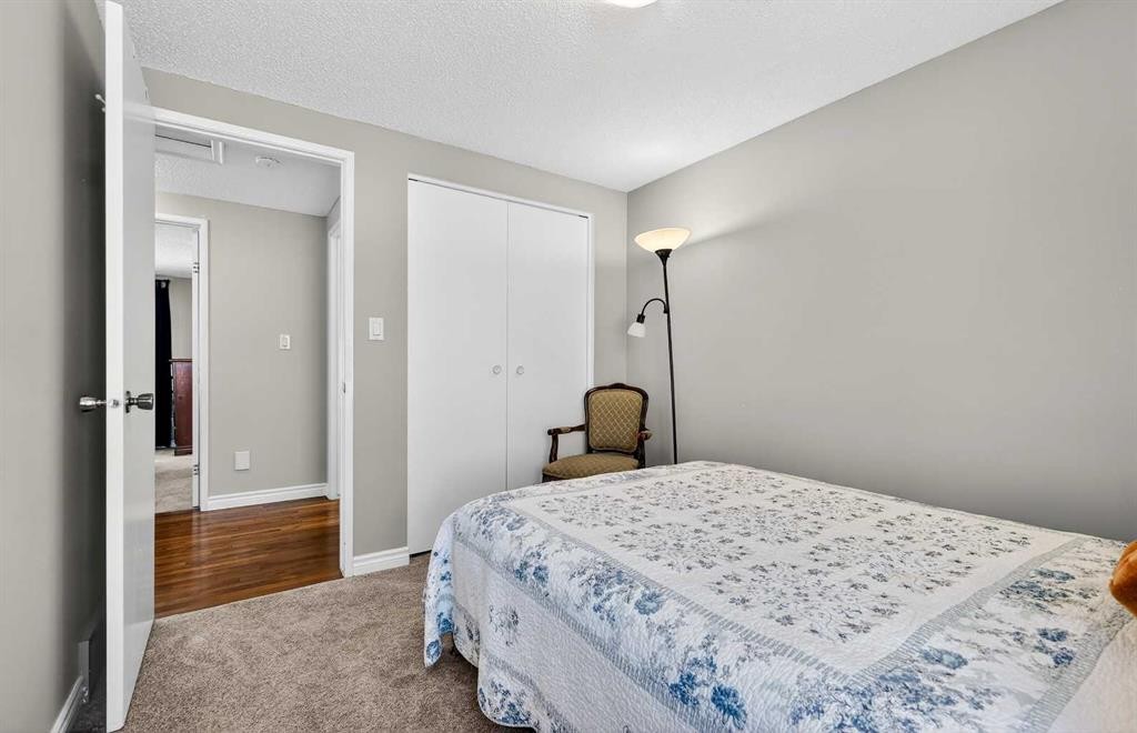 168 Midlake Boulevard Se, Calgary, AB - Indoor Photo Showing Bedroom