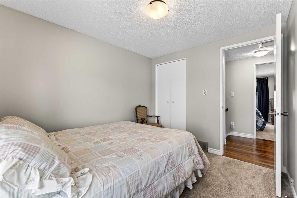 168 Midlake Boulevard Se, Calgary, AB - Indoor Photo Showing Bedroom
