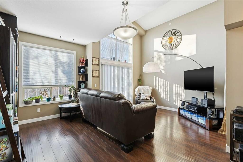 411-4303 1 Street Ne, Calgary, AB - Indoor Photo Showing Living Room