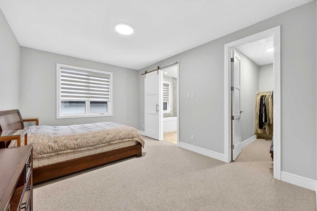 95 Rock Lake View Nw, Calgary, AB - Indoor Photo Showing Bedroom