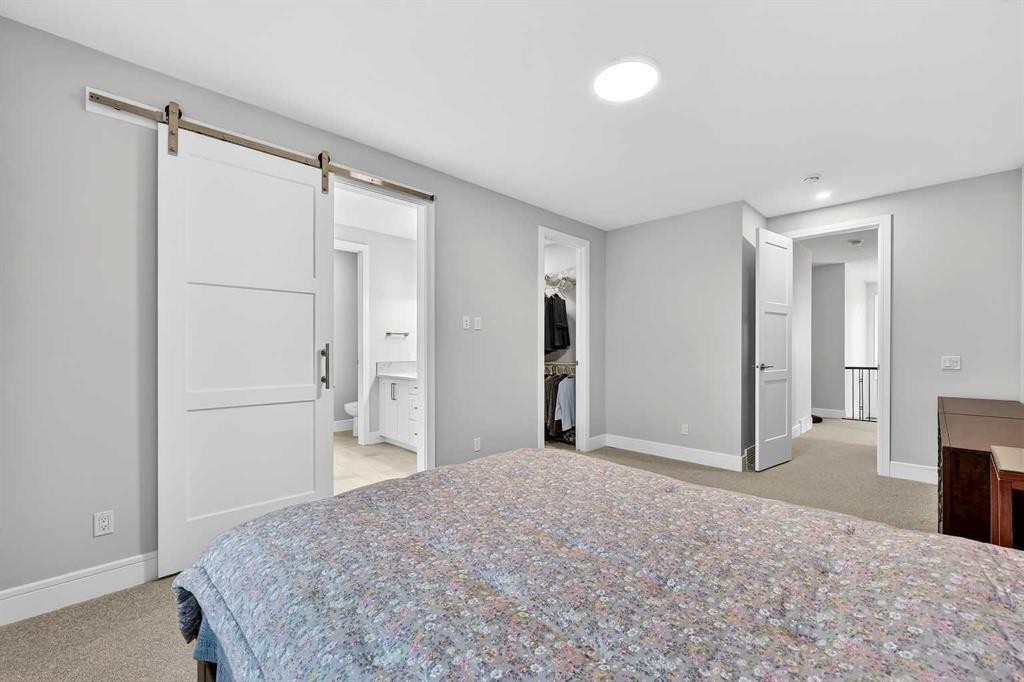 95 Rock Lake View Nw, Calgary, AB - Indoor Photo Showing Bedroom