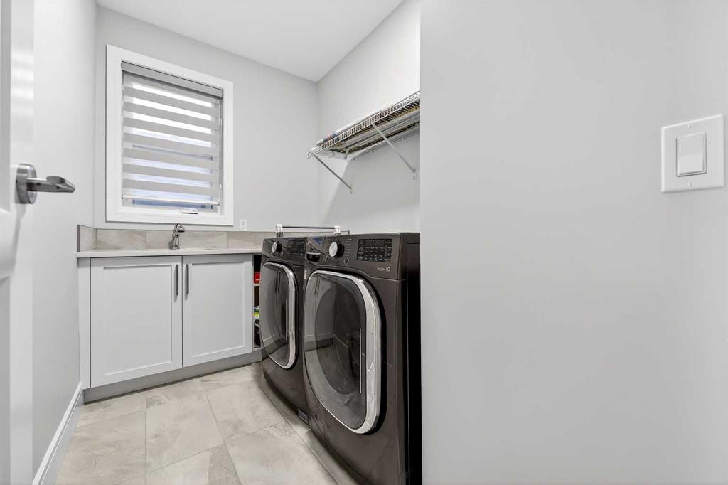 95 Rock Lake View Nw, Calgary, AB - Indoor Photo Showing Laundry Room