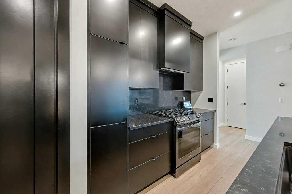 123 Treeline View Sw, Calgary, AB - Indoor Photo Showing Kitchen With Upgraded Kitchen