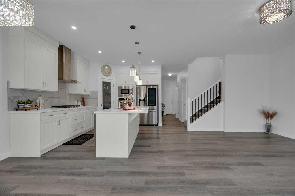 #208 Dawson Harbour Heights, Chestermere, AB - Indoor Photo Showing Kitchen With Upgraded Kitchen
