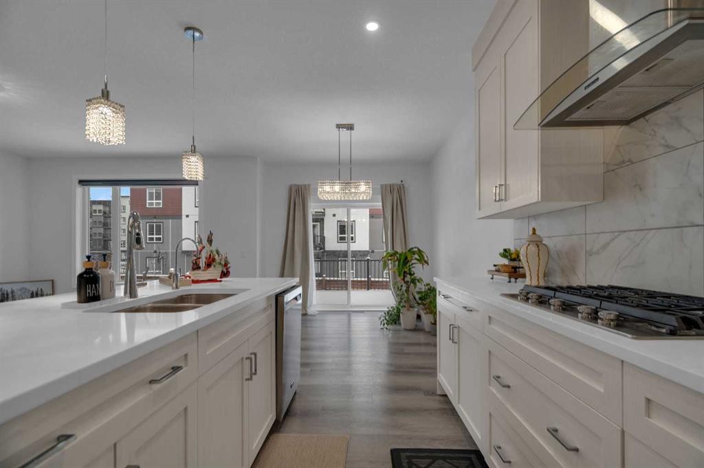 #208 Dawson Harbour Heights, Chestermere, AB - Indoor Photo Showing Kitchen With Double Sink With Upgraded Kitchen