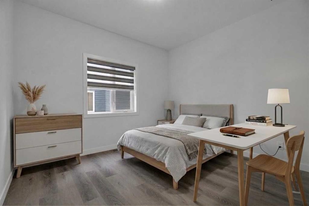 #208 Dawson Harbour Heights, Chestermere, AB - Indoor Photo Showing Bedroom